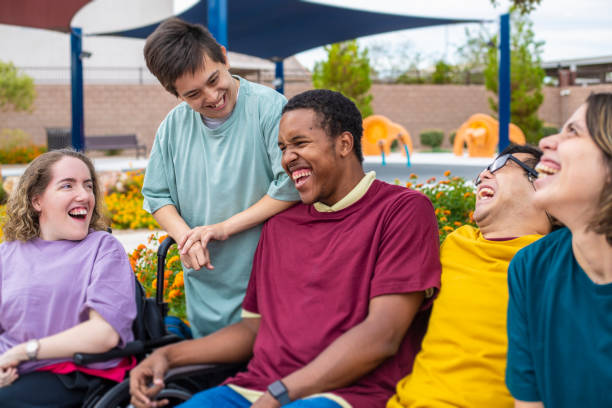 A group of disabled people laughing